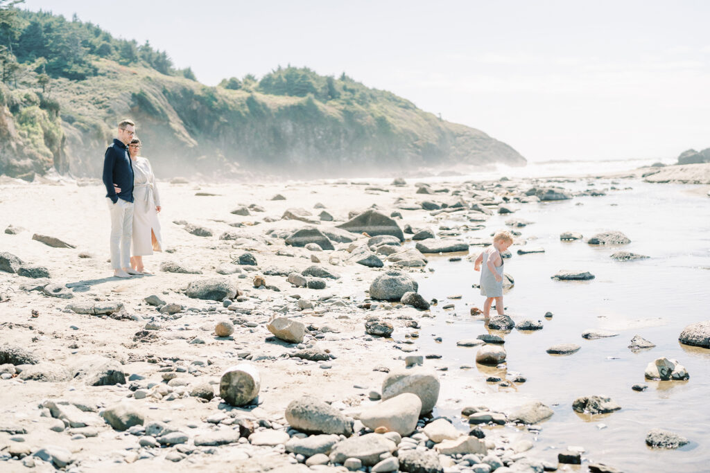 Family of 3 explores the oregon coast during family photos by Lincoln city photographer Samantha Shannon