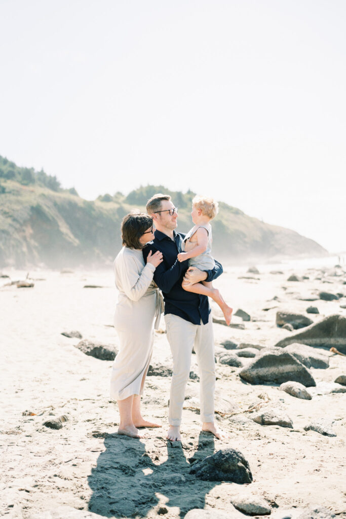 Family of 3 explores the oregon coast during family photos by Lincoln city photographer Samantha Shannon