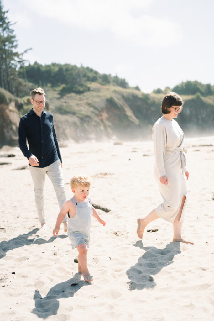 Family of 3 explores the oregon coast during family photos by Lincoln city photographer Samantha Shannon